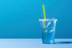 bleu boisson dans une Plastique tasse isolé sur une bleu Contexte. prendre une façon les boissons concept avec copie espace. ai généré photo