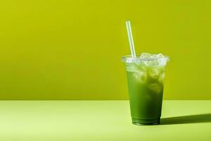 vert boisson dans une Plastique tasse isolé sur une vert Contexte. prendre une façon les boissons concept avec copie espace. ai généré photo