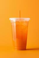 Orange Couleur boisson dans une Plastique tasse isolé sur une Orange Couleur Contexte. prendre une façon les boissons concept. ai généré photo