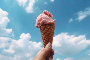 main en portant fraise la glace crème avec cône isolé sur une bleu ciel et nuage Contexte. ai généré photo