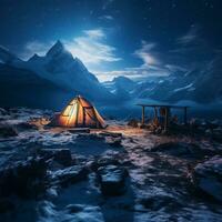 scénique vue de illuminé tente sur neigeux montagnes. génératif ai photo