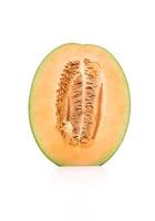 Melon cantaloup sur fond blanc photo