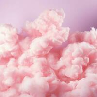 une coton bonbons rose Contexte avec duveteux des nuages photo