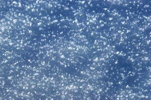 une proche en haut de neige chute de le ciel photo