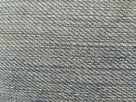 gris en tissu Contexte. texture de le textile matériel. photo