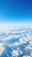 panoramique vue de des champs et des nuages de un avion la fenêtre. le ciel est une brillant bleu avec duveteux blanc des nuages. génératif ai photo