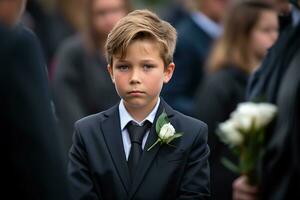 portrait de une garçon dans une noir costume avec une funéraire bouquet de fleurs ai généré photo