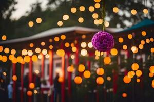 une violet Balle pendaison de une chaîne de lumières. généré par ai photo