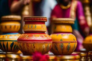 une groupe de coloré des pots séance sur une tableau. généré par ai photo