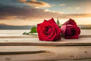deux rouge des roses sur une en bois table avec une le coucher du soleil dans le Contexte. généré par ai photo