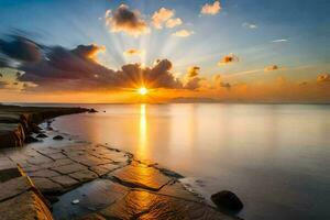 le coucher du soleil plus de le mer. généré par ai photo