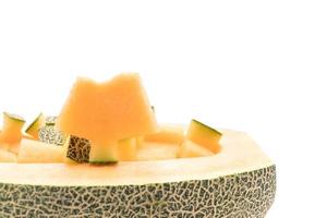 Melon cantaloup sur fond blanc photo