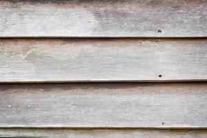 fond de texture de mur de planche de bois brun grungy photo