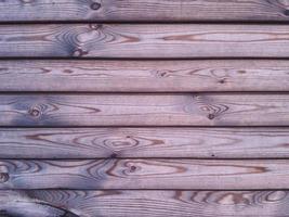 fond de planches brutes en bois horizontales. photo