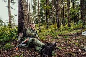 une terroriste sur une Pause de guerre, repos pendant lourd guerre tarif et attaque photo