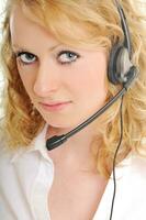 femme blonde d'affaires avec casque photo