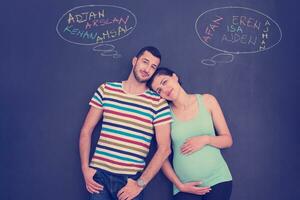 couple enceinte écrit sur un tableau noir photo