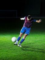 joueur de football en action photo