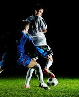 joueurs de football en action pour le ballon photo