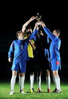 Football joueurs célébrer le la victoire photo