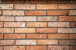 vieux brique mur, vieux texture de rouge pierre blocs fermer photo