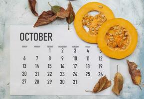 octobre 2019 papier calendrier avec citrouille tranches photo