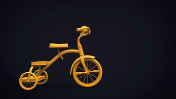 ancien Jaune jouet tricycle sur noir Contexte photo