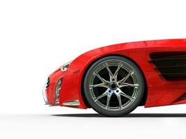 rouge supercar - de face roue fermer - Couper coup photo