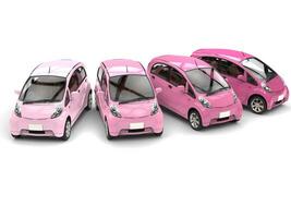 économique moderne compact voitures dans nuances de rose photo