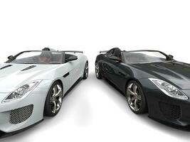 extraordinaire noir et blanc moderne convertible des sports voitures - phare fermer coup photo