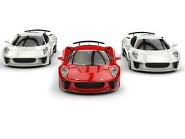 impressionnant des sports voitures - rouge et blanc côté par côté photo