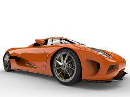 foncé flamme Orange moderne super sport concept voiture - de face roue fermer coup photo