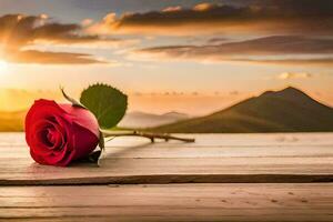 une Célibataire rouge Rose est assis sur une en bois table dans de face de une le coucher du soleil. généré par ai photo