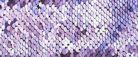 violet abstrait paillettes pétillant Contexte. texture de paillettes. photo
