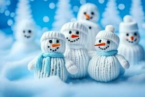 bonhommes de neige tricoté dans blanc et bleu. généré par ai photo