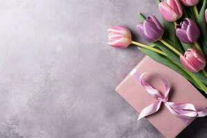 décoratif de tulipes fleurs bouquet ou enveloppé cadeau boîte. pour les mères journée ou Valentin avec fond concept par ai généré photo