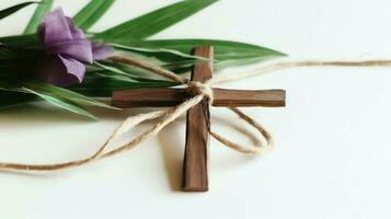 une Christian en bois traverser crucifix signe avec vert paume feuilles comme religieux vacances. paume dimanche un événement concept par ai généré photo