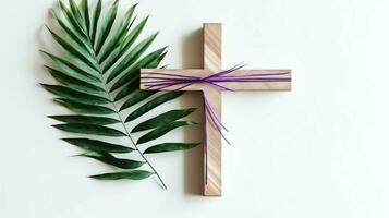 une Christian en bois traverser crucifix signe avec vert paume feuilles comme religieux vacances. paume dimanche un événement concept par ai généré photo