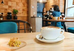 une tasse de café dans café magasin ai généré photo