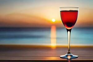 une verre de rouge du vin sur une table dans de face de le océan. généré par ai photo