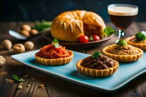 une assiette avec quatre mini tartes et une verre de bière. généré par ai photo