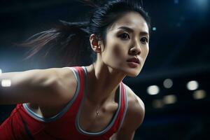 ai génératif déterminé asiatique femelle athlète dans action à une des sports arène en dessous de vibrant stade lumières photo