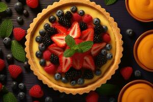 Frais fruit Tarte avec baies et menthe sur foncé en bois Contexte photo