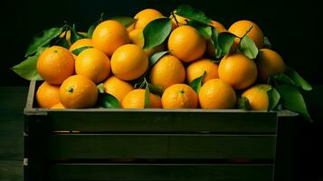 boîte avec des oranges sur une noir Contexte. en bonne santé nourriture, vitamine c, super aliment. photo