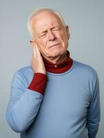 homme avec douleur sur neutre Contexte ai génératif photo