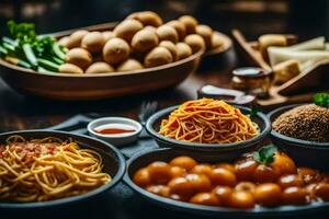 une table avec boules de Pâtes, Viande et des légumes. généré par ai photo