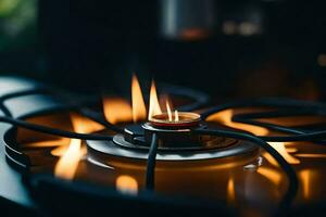 une proche en haut de une gaz le fourneau avec une allumé bougie. généré par ai photo