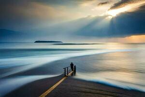 une homme des stands sur le plage avec le Soleil brillant par le des nuages. généré par ai photo