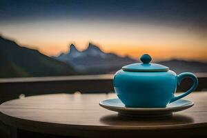 une bleu théière sur une table dans de face de une Montagne voir. généré par ai photo