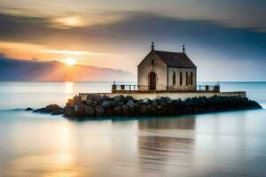 une petit église est assis sur le rochers à le coucher du soleil. généré par ai photo